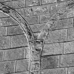 LIBČANY: detail pozůstatku po slepé arkádě na jižním průčelí lodi (foto M. Falta 2006).